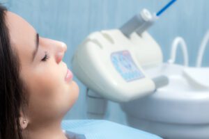 relaxed young woman in a dental chair, sedation dentistry
